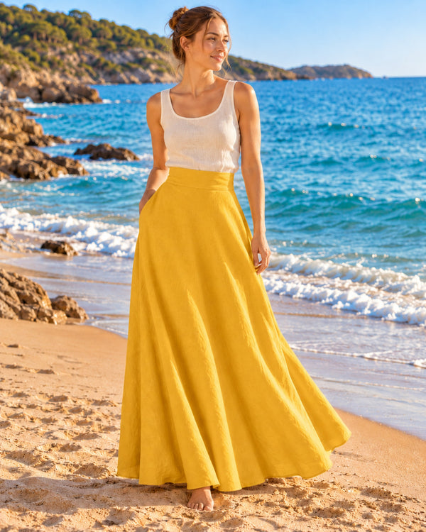 Mustard linen flared maxi skirt VIVIAN with a fixed waistband and side pockets, front view